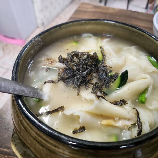 Close-up of Kalguksu, a Korean noodle soup